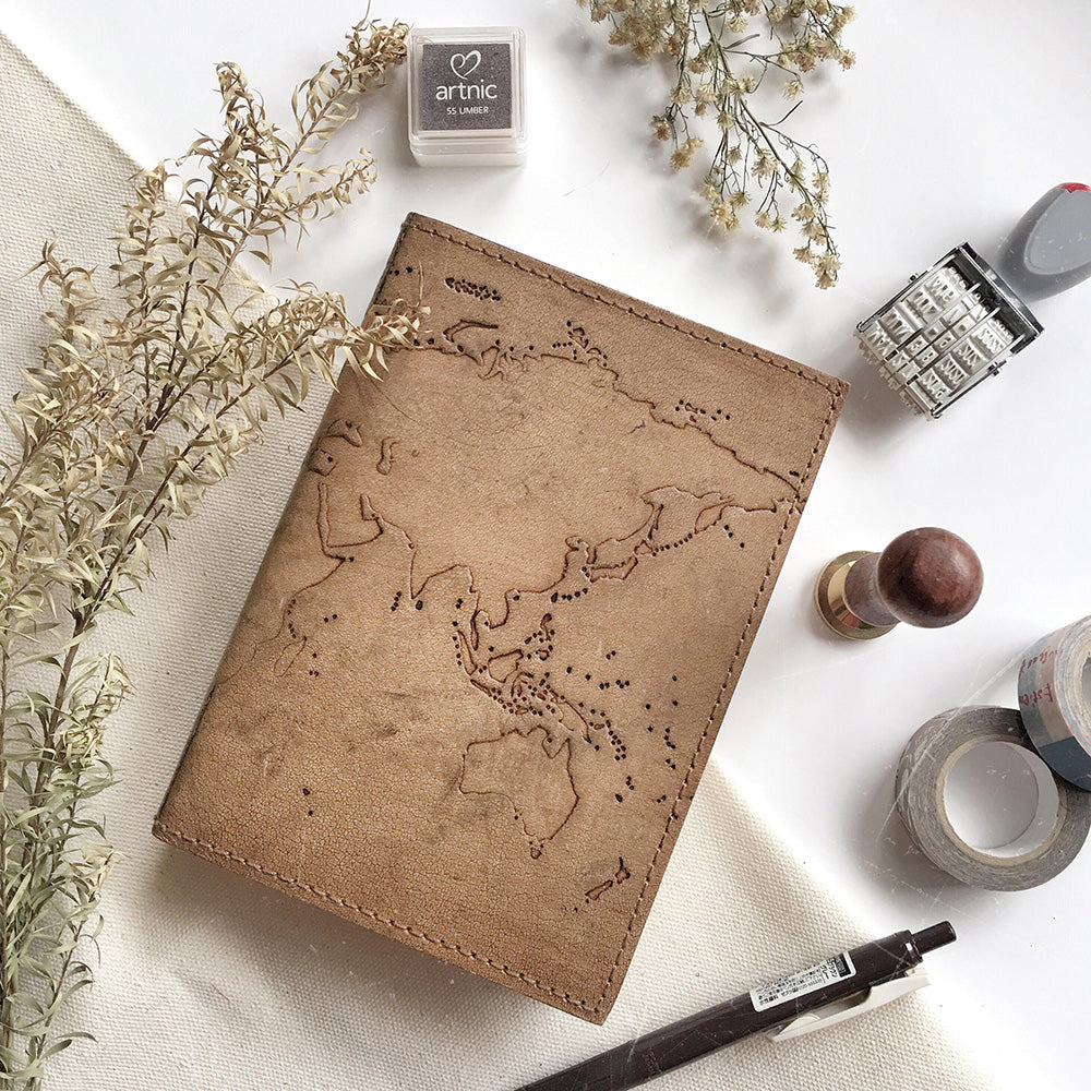 Vintage-style world map leather journal – ideal gift for travelers, writers, and geography lovers