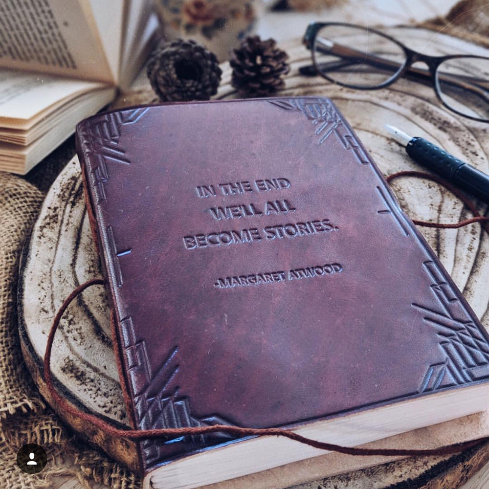 Rustic leather diary with embossed quote “We all become stories” – perfect for dreamers and creatives