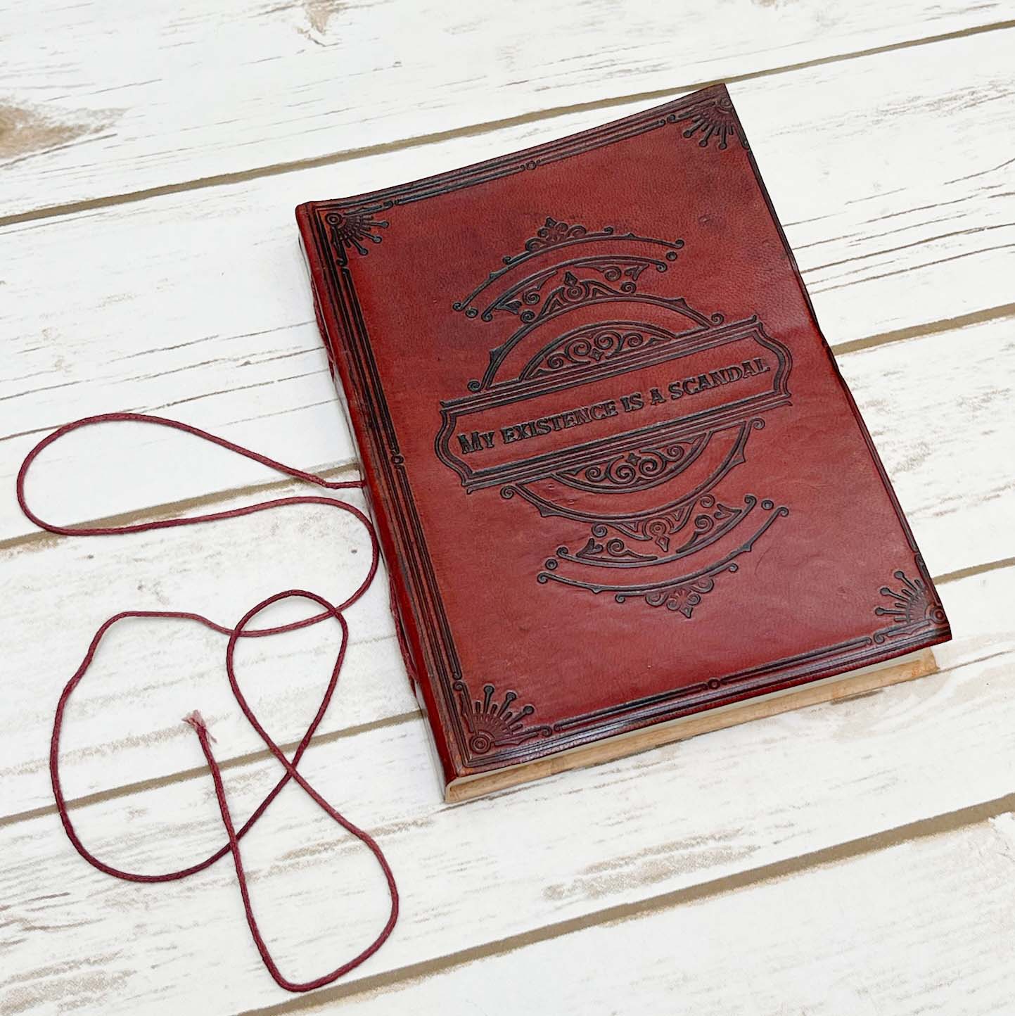 Whimsical leather notebook with charming frame design illustrations in cover – mystical journal for spiritual writing and art