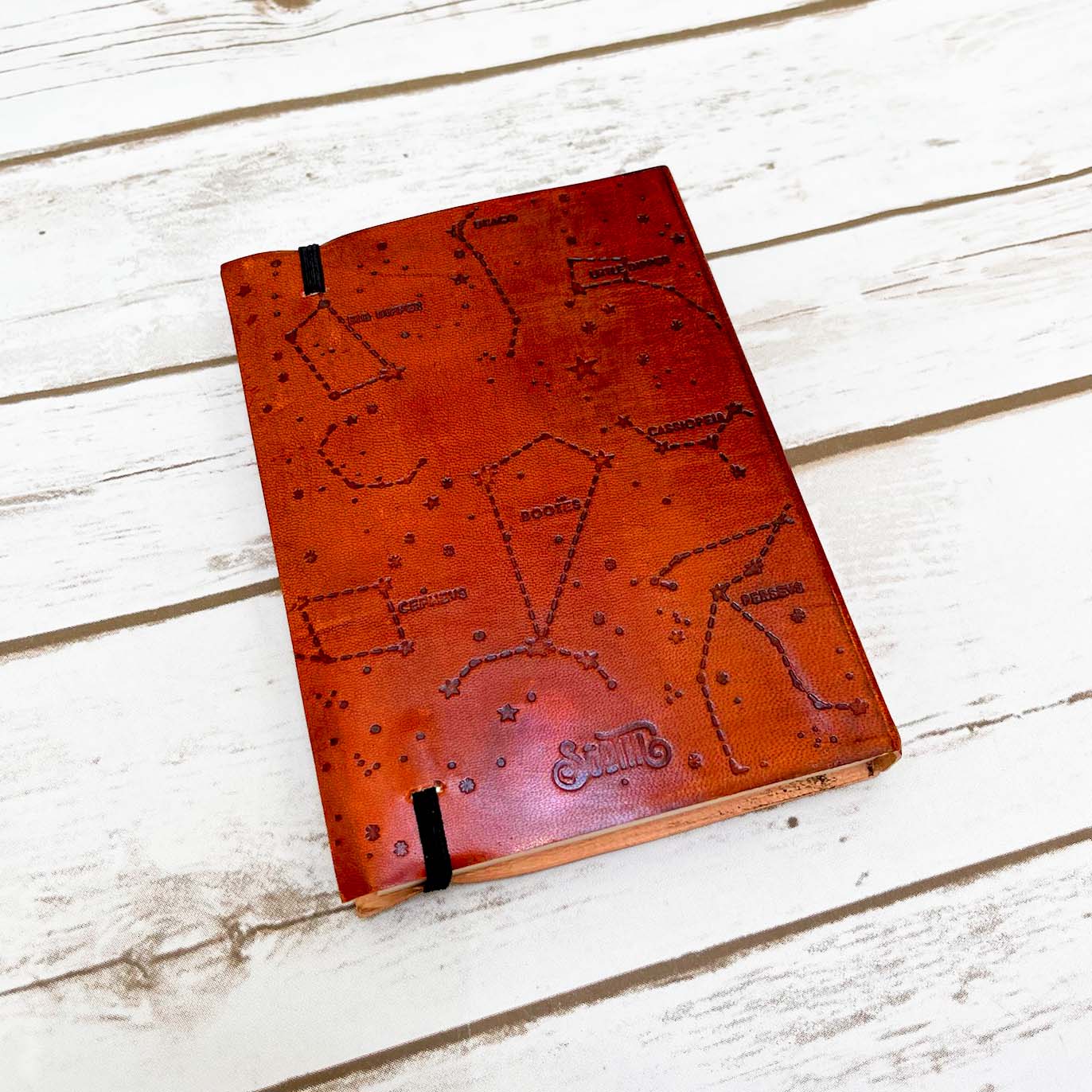 Leather-bound journal embossed with the quote “In The Soul Of Every New Born Baby Words Are Waiting To Be Written - perfect for documenting new borns progress, baby diary