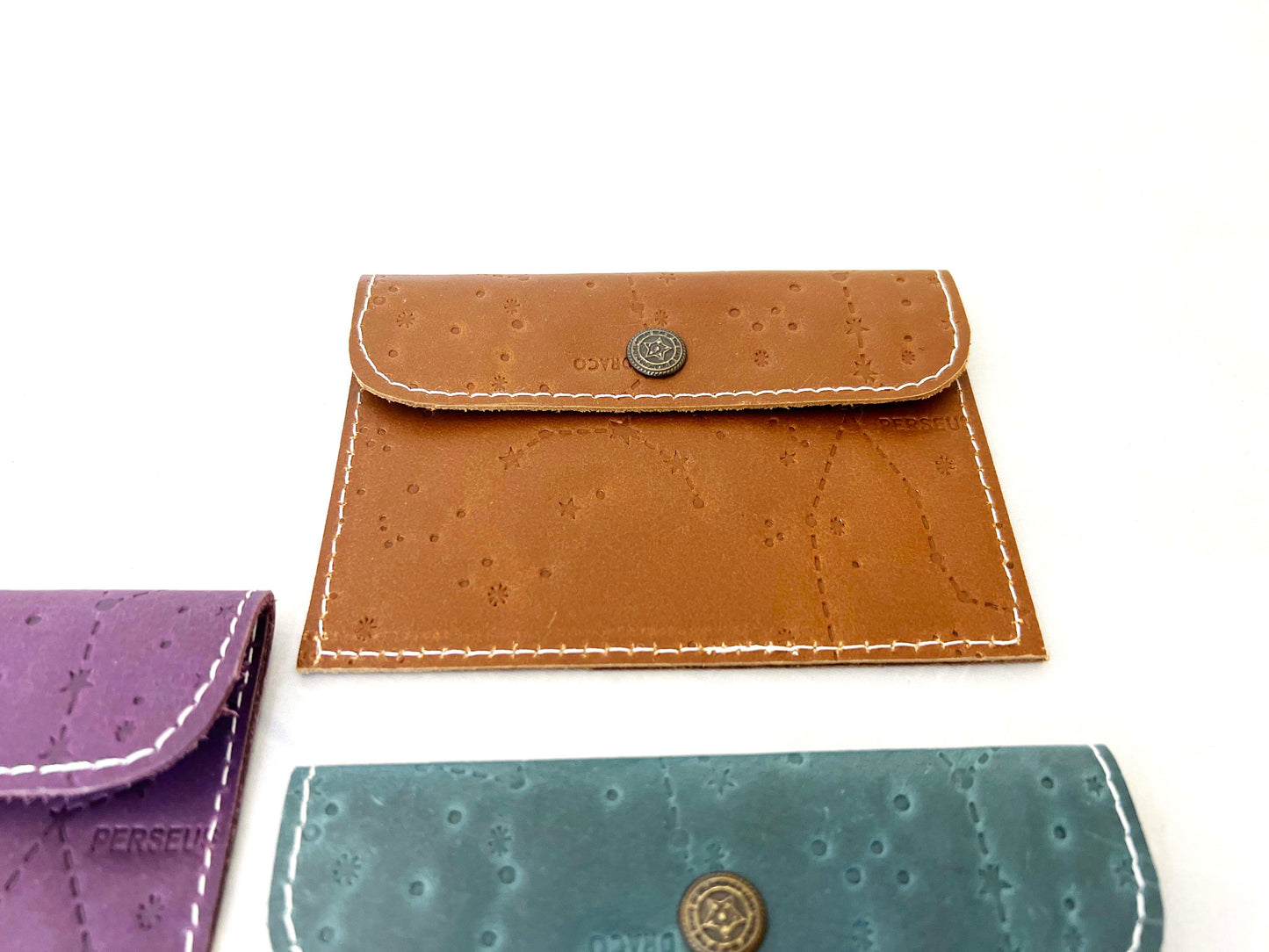 Leather envelope wallet with celestial constellation pattern – available in teal, purple, and brown for a dreamy, star-kissed touch of elegance