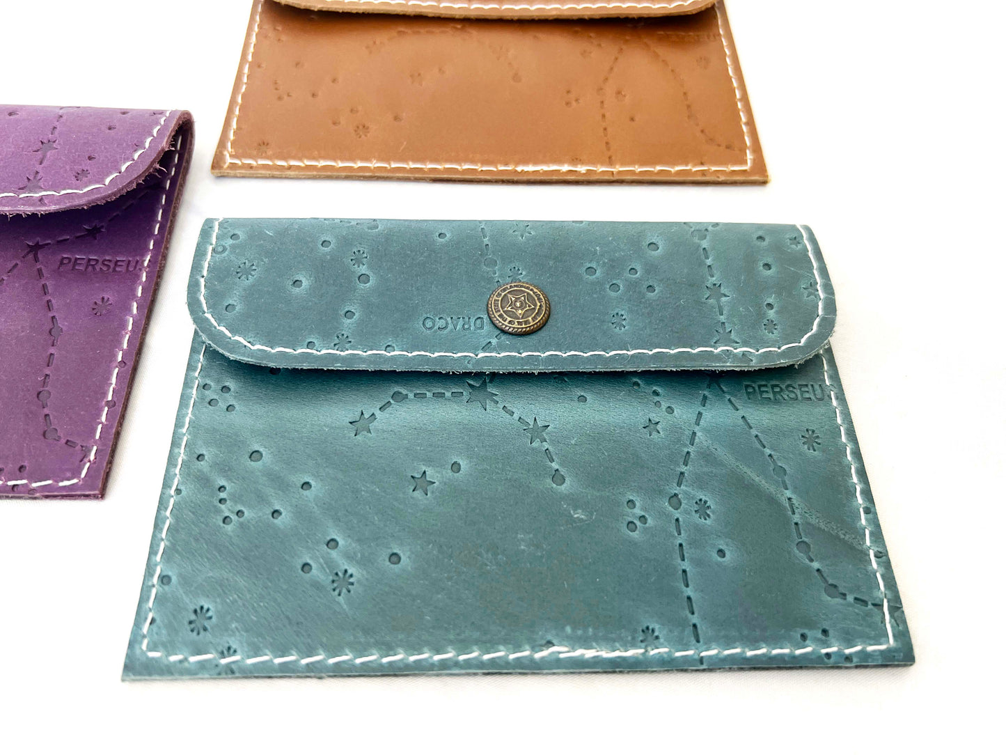 Leather envelope wallet with celestial constellation pattern – available in teal, purple, and brown for a dreamy, star-kissed touch of elegance