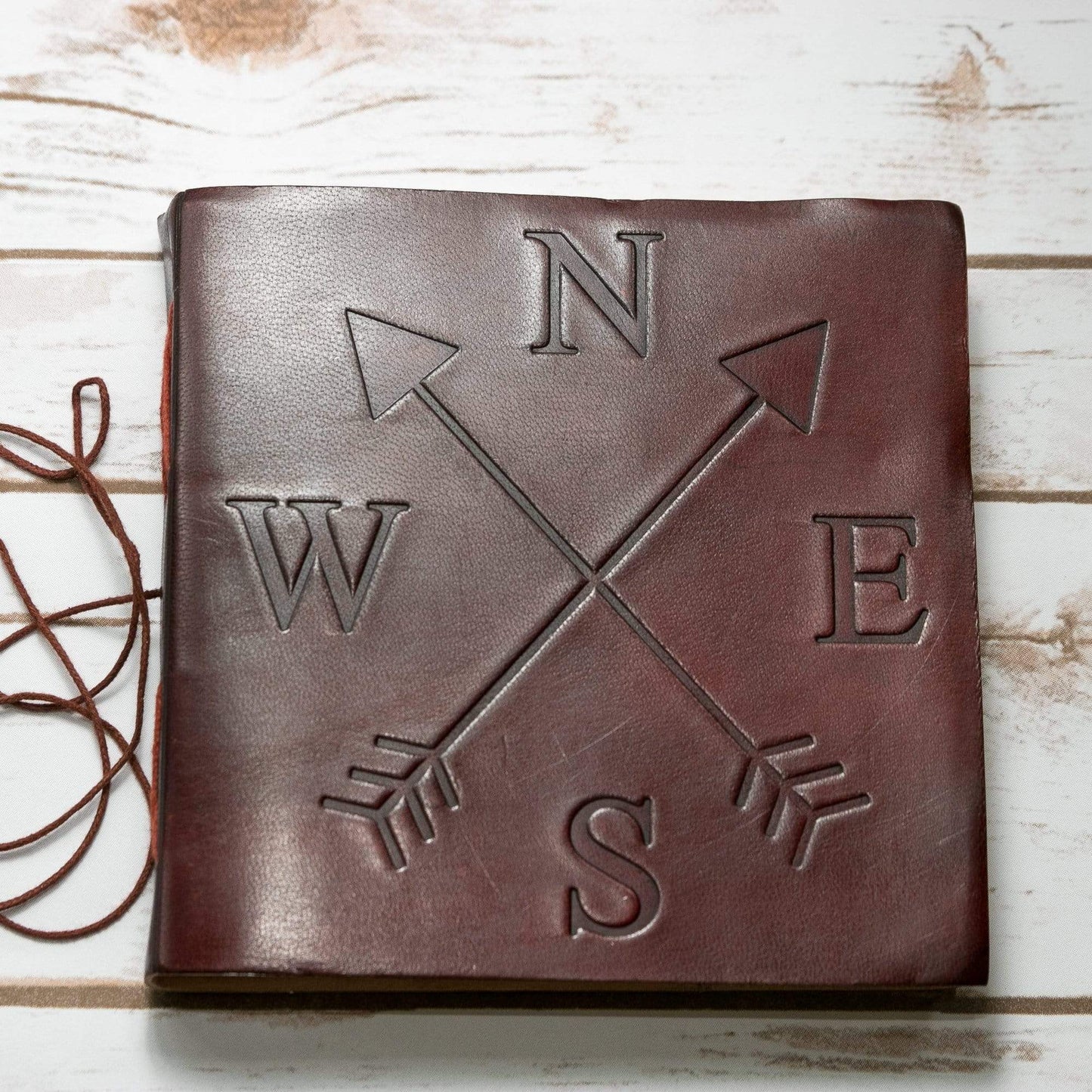 Leather journal embossed with compass – handcrafted travel-inspired journal for adventurers, writers, and seekers of direction