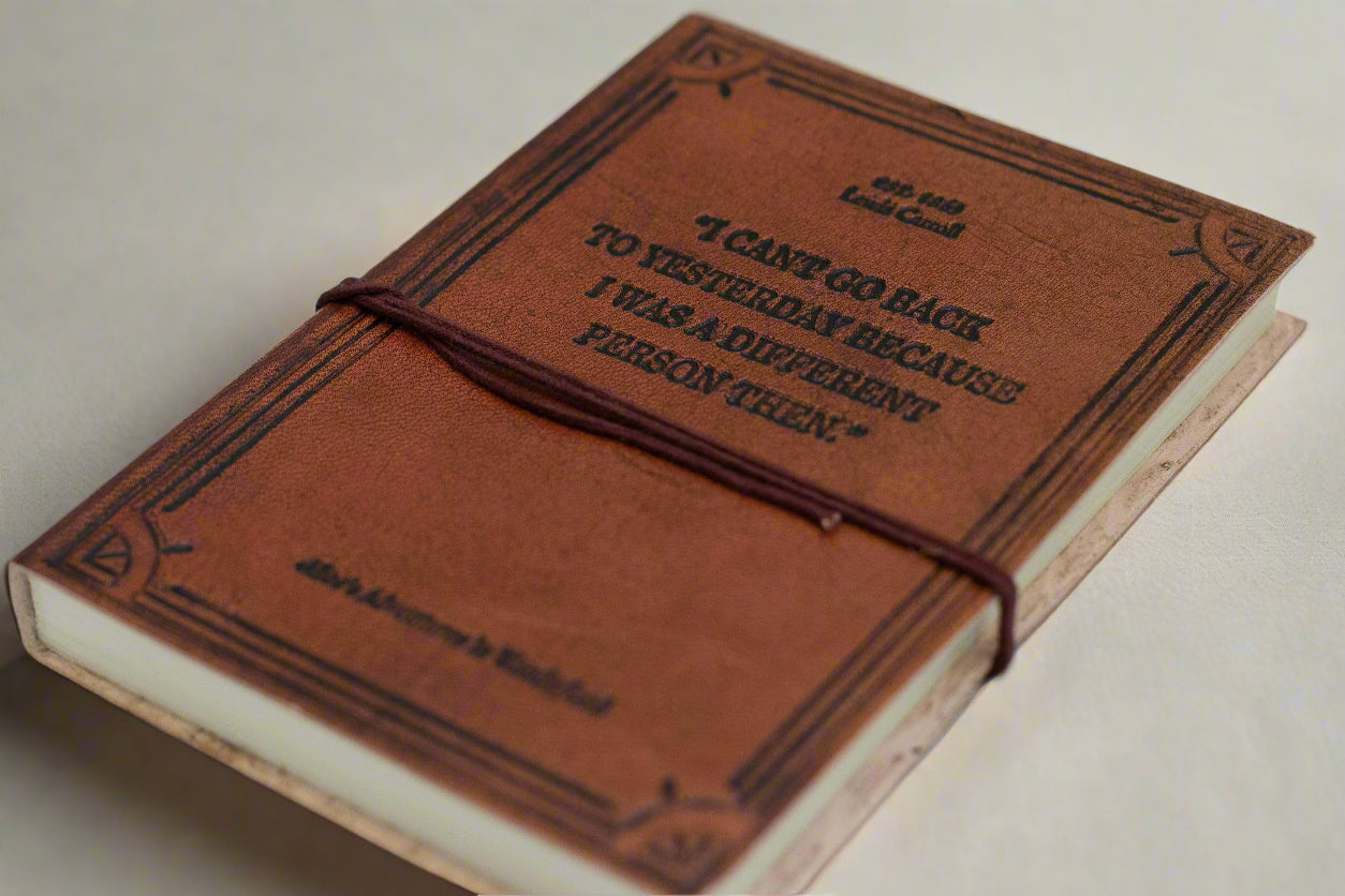 Earth-toned leather journal featuring embossed life quote – thoughtful companion for journaling and sketching on the go