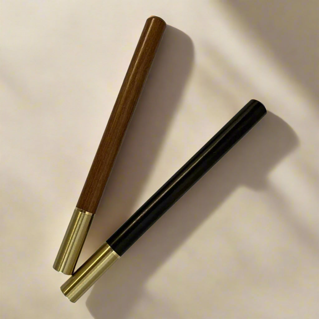 Handcrafted wood pen in oak and ebony with metallic gold accents – timeless elegance for refined writing