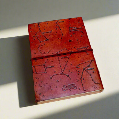 Earth-toned leather journal featuring embossed life quote – thoughtful companion for journaling and sketching on the go