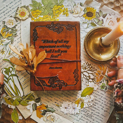 Earth-toned leather journal featuring embossed life quote – thoughtful companion for journaling and sketching on the go