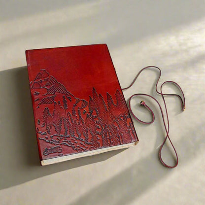 Illustrated leather notebook with mountains and trees embossing – eco-conscious journal for nature lovers, adventurers, and travelers