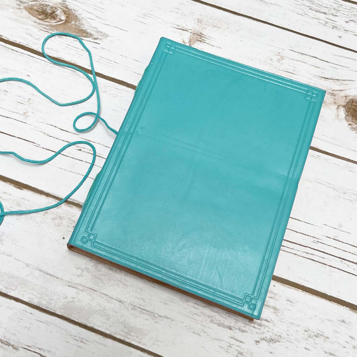 Bespoke leather journal – front cover customization available for logos, symbols, and special messages