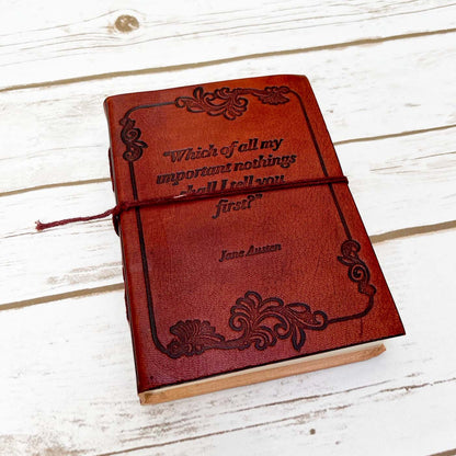 Earth-toned leather journal featuring embossed life quote – thoughtful companion for journaling and sketching on the go