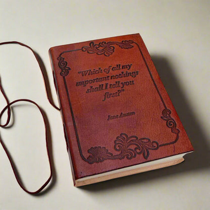 Earth-toned leather journal featuring embossed life quote – thoughtful companion for journaling and sketching on the go