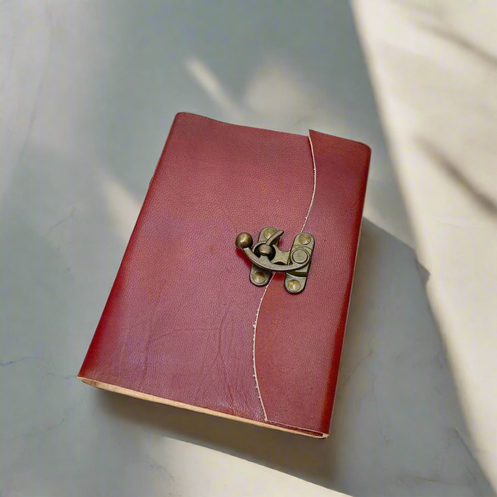 Rustic leather-bound journal with latch – handcrafted, old-world style notebook for writing, sketching, and timeless journaling