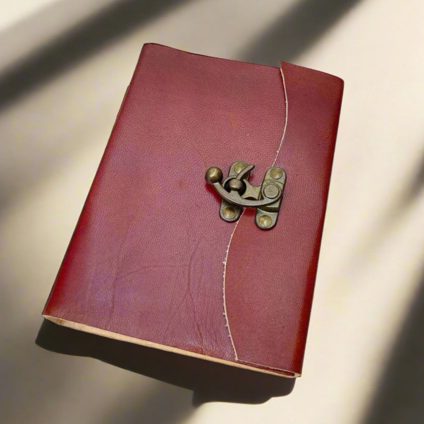 Rustic leather-bound journal with latch – handcrafted, old-world style notebook for writing, sketching, and timeless journaling