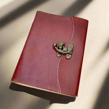 Rustic leather-bound journal with latch – handcrafted, old-world style notebook for writing, sketching, and timeless journaling