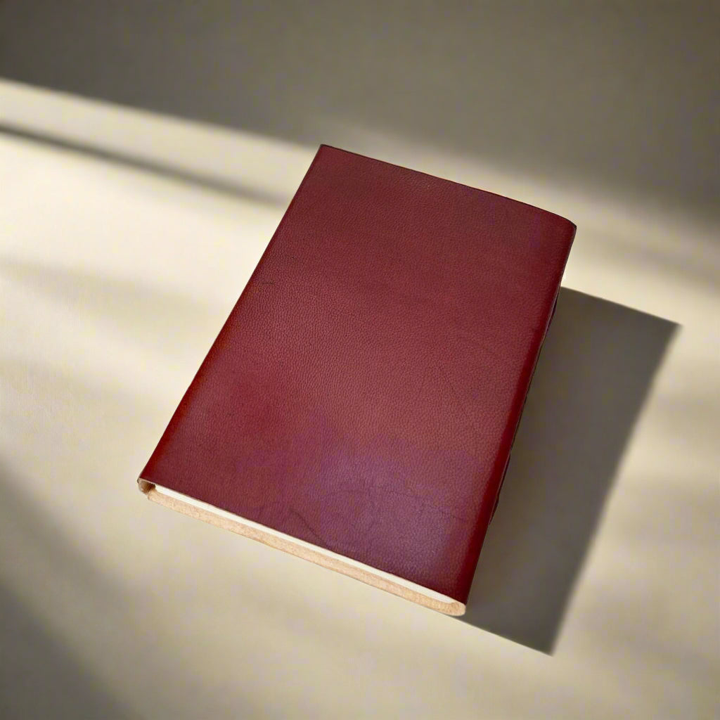 Rustic leather-bound journal with latch – handcrafted, old-world style notebook for writing, sketching, and timeless journaling