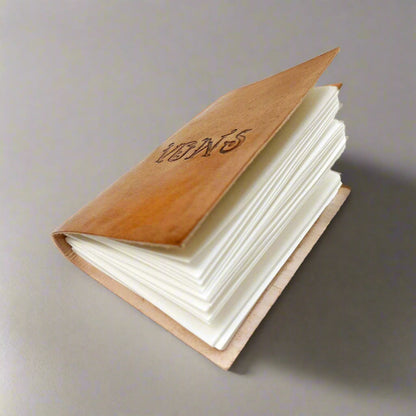 Handcrafted leather vow book – ideal for guest lists, speeches, and intimate wedding notes