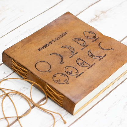Soothi leather journal embossed with moon phases – celestial-inspired, handcrafted notebook for lunar journaling, intention setting, and spiritual reflection