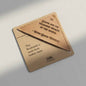 Leather bookmark with text on a light gray background