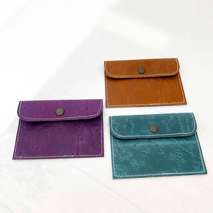 Leather envelope wallet with celestial constellation pattern – available in teal, purple, and brown for a dreamy, star-kissed touch of elegance