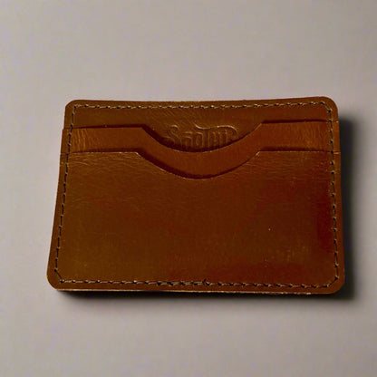 Genuine leather wallet – available in teal, purple, and brown for a pop of personality with timeless style