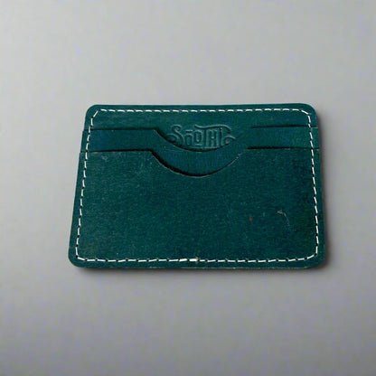 Genuine leather wallet – available in teal, purple, and brown for a pop of personality with timeless style