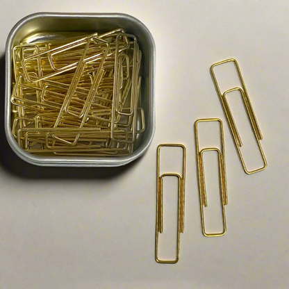 Stylish gold paper clips in unique geometric shapes – modern, functional, and perfect for adding flair to your workspace