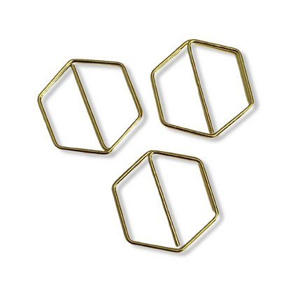 Stylish gold paper clips in unique geometric shapes – modern, functional, and perfect for adding flair to your workspace