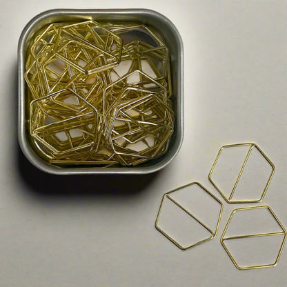 Stylish gold paper clips in unique geometric shapes – modern, functional, and perfect for adding flair to your workspace