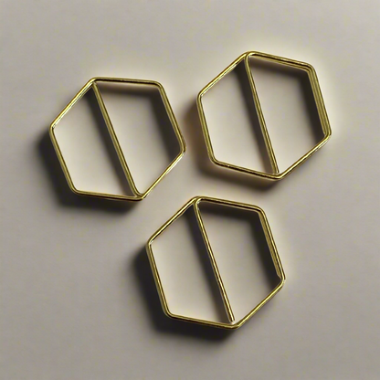 Stylish gold paper clips in unique geometric shapes – modern, functional, and perfect for adding flair to your workspace
