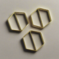 Stylish gold paper clips in unique geometric shapes – modern, functional, and perfect for adding flair to your workspace
