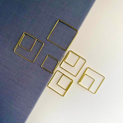 Stylish gold paper clips in unique geometric shapes – modern, functional, and perfect for adding flair to your workspace
