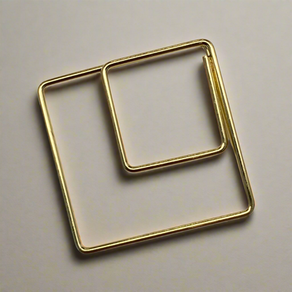 Stylish gold paper clips in unique geometric shapes – modern, functional, and perfect for adding flair to your workspace