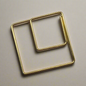 Stylish gold paper clips in unique geometric shapes – modern, functional, and perfect for adding flair to your workspace