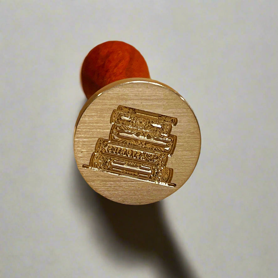 Gold-toned wax seal with stacks of books engraving – classic detail for modern creatives, old-soul writers, and bookworms