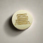 Gold-toned wax seal with stacks of books engraving – classic detail for modern creatives, old-soul writers, and bookworms