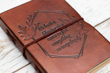 Handcrafted leather-bound diary with inspirational cover text – eco-conscious gift for seekers and storytellers
