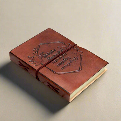 Handcrafted leather-bound diary with inspirational cover text – eco-conscious gift for seekers and storytellers
