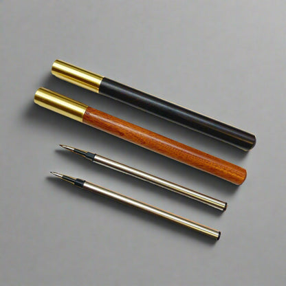 Handcrafted wood pen in oak and ebony with metallic gold accents – timeless elegance for refined writing