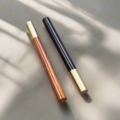 Handcrafted wood pen in oak and ebony with metallic gold accents – timeless elegance for refined writing
