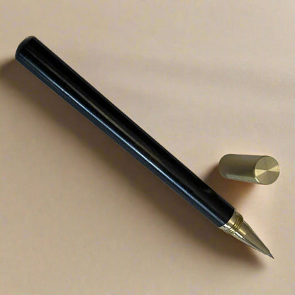 Handcrafted wood pen in oak and ebony with metallic gold accents – timeless elegance for refined writing