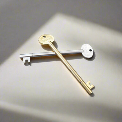 Vintage key-shaped pen in gold and silver metallic finish – unlock your creativity with every word