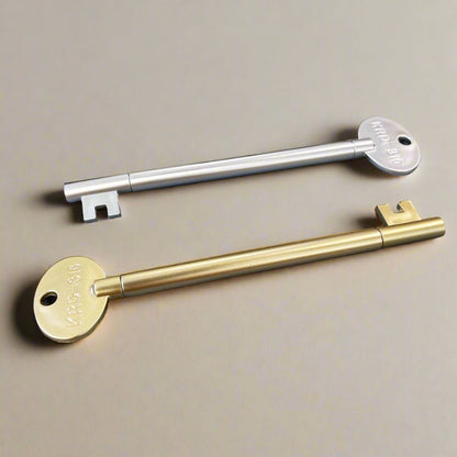 Vintage key-shaped pen in gold and silver metallic finish – unlock your creativity with every word